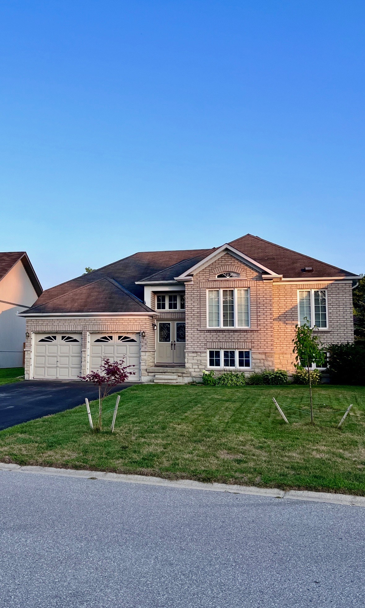 Front exterior at 55 Regina Boulevard, Wasaga Beach