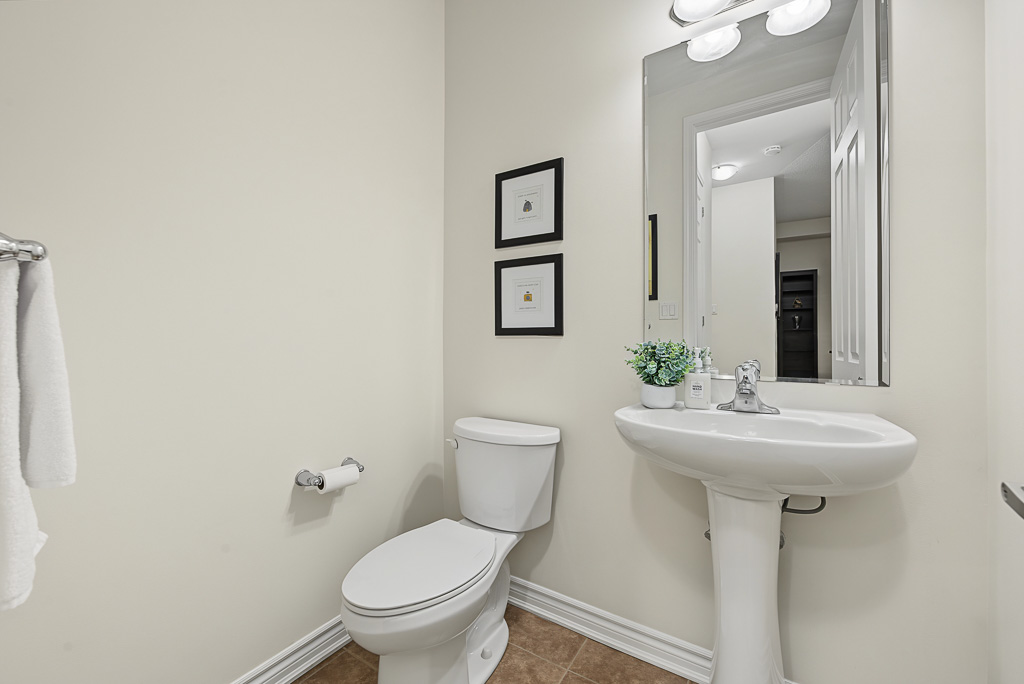 Main-floor powder room at 1531 Tough Gate, Milton