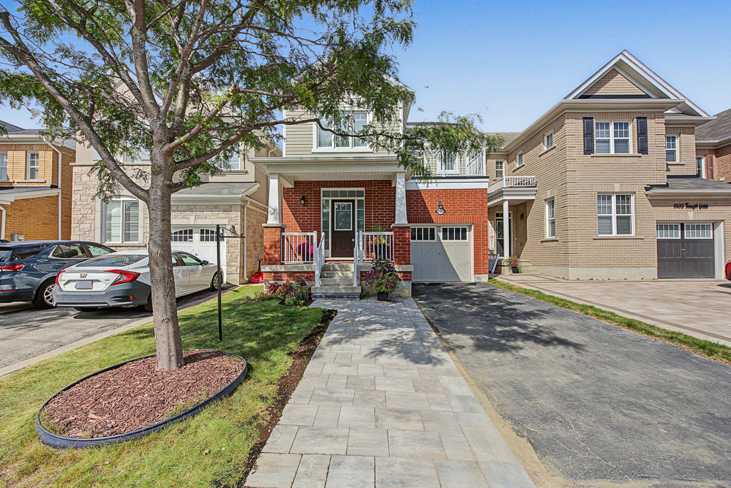 Front exterior and landscaped walkway at 1531 Tough Gate, Milton