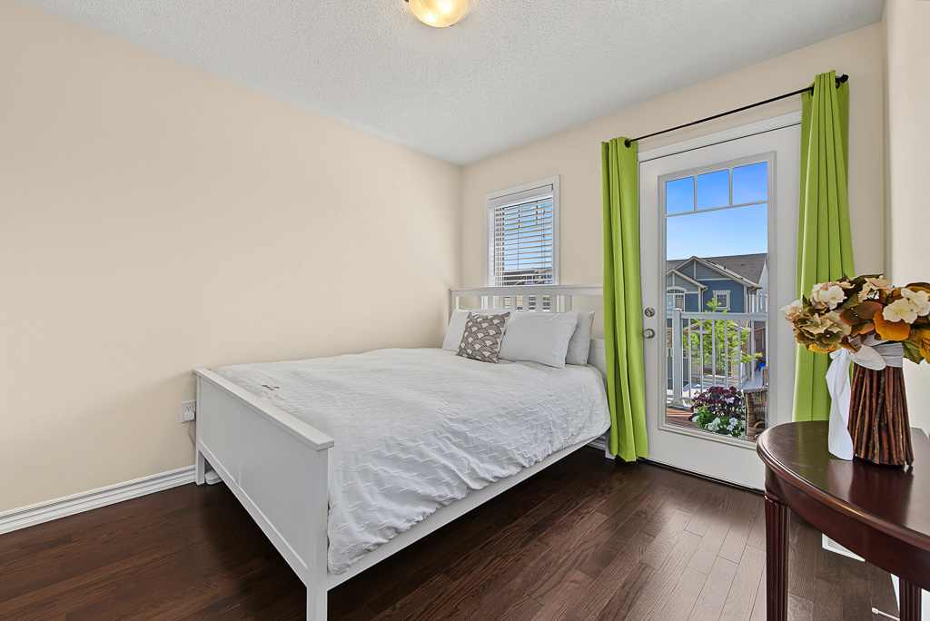 Bedroom with balcony access at 1531 Tough Gate, Milton