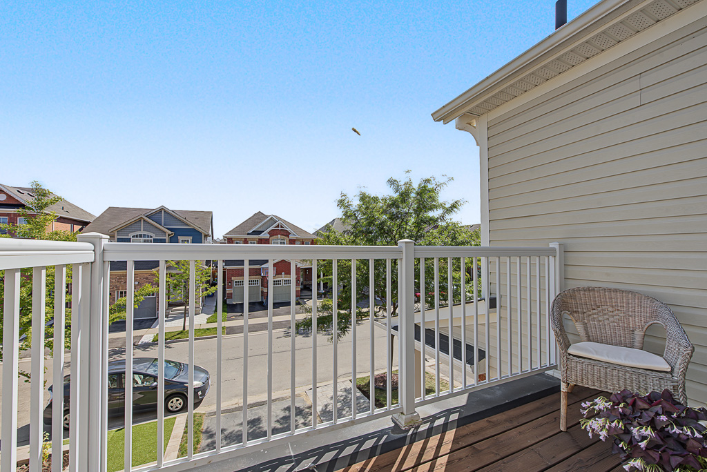 Front balcony and street view at 1531 Tough Gate, Milton