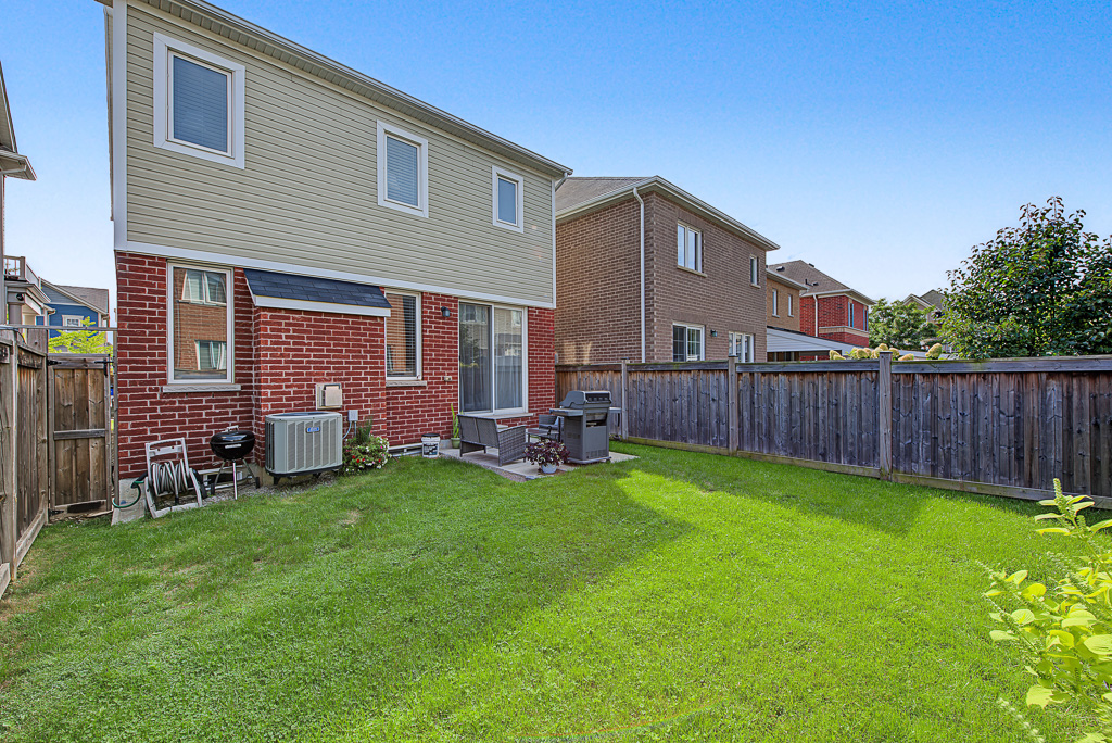 Backyard lawn at 1531 Tough Gate, Milton