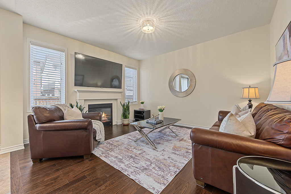 Living room with fireplace at 1531 Tough Gate, Milton