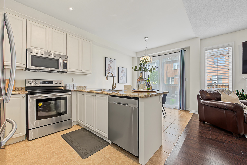Kitchen with stainless steel appliances at 1531 Tough Gate, Milton